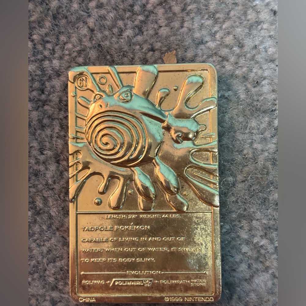 Vintage 1999 Gold Plated Poliwhirl gold Pokemon card.